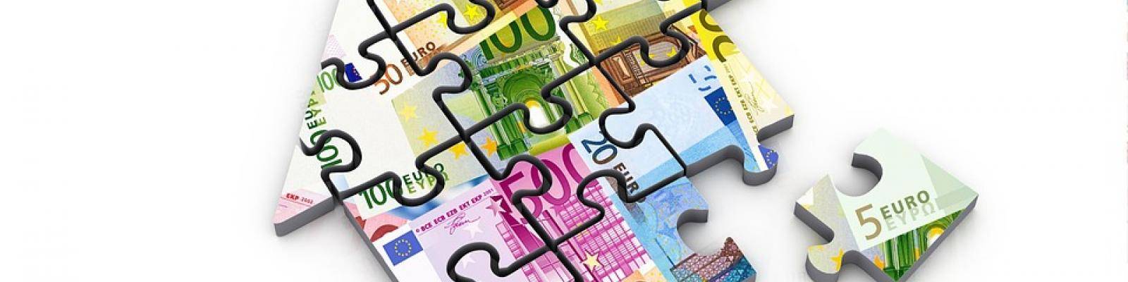 Puzzel huis geld